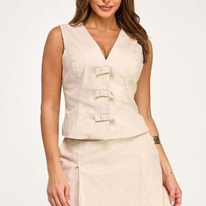 CONJUNTO BLUSA CON MOÑOS, SHORT FALDA